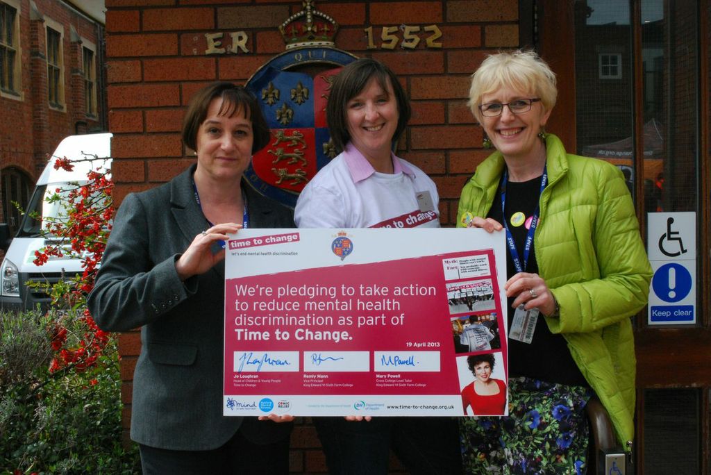 Kind Edwards College staff sign the pledge with Head of Children and Young People project Jo Loughran