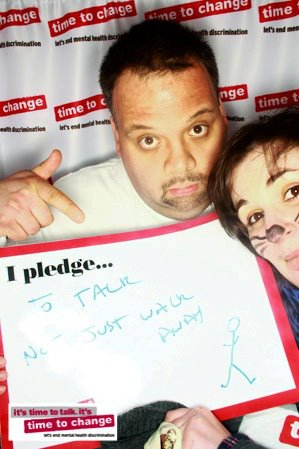 Man and woman in Time to Change photo booth