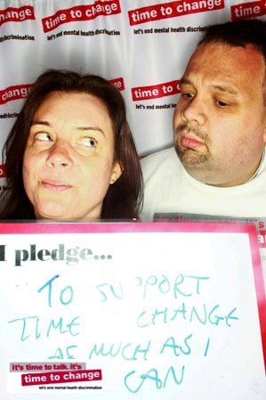 Man and woman in Time to Change photo booth