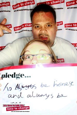 Man and woman in Time to Change photo booth