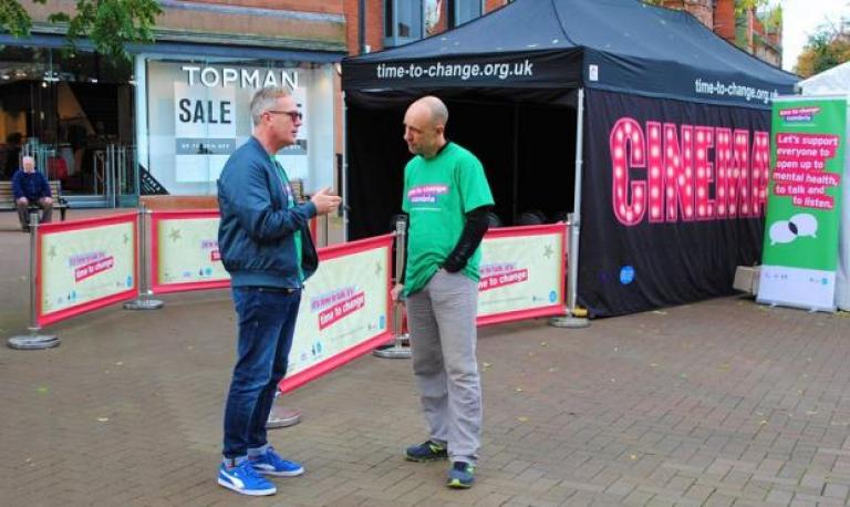 two man having a conversation at a Time to Change event