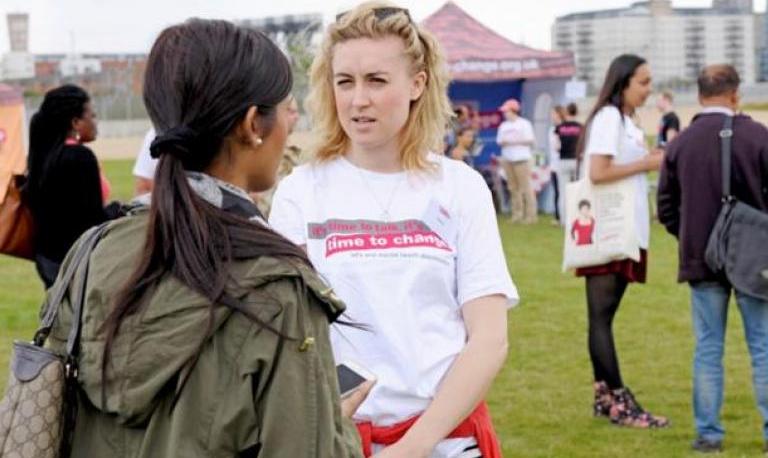 a champion talking to a member of the public